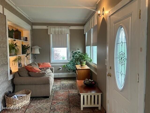 21 River St, North Adams, MA 01247 - foyer with a baseboard heating unit and ornamental molding