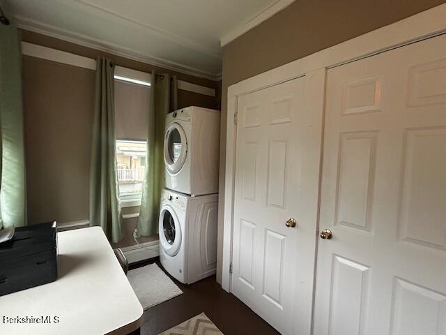 21 River St, North Adams, MA 01247 - laundry room featuring stacked washer / drying machine and ornamental molding