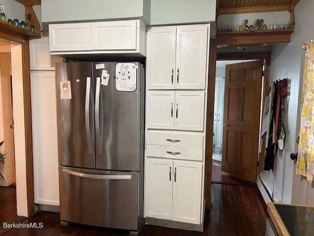 21 River St, North Adams, MA 01247 - kitchen featuring freestanding refrigerator, dark wood finished floors, and white cabinets
