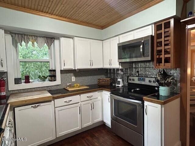 21 River St, North Adams, MA 01247 - kitchen with appliances with stainless steel finishes, white cabinetry, dark countertops, wood ceiling, and dark wood-style flooring