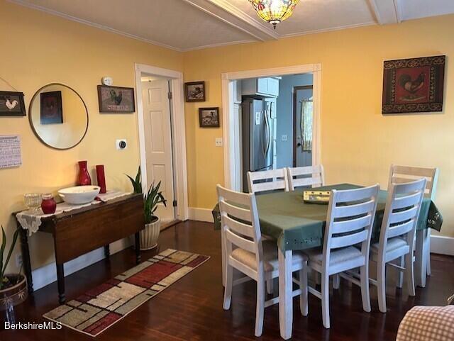21 River St, North Adams, MA 01247 - dining area with wood finished floors, crown molding, and baseboards