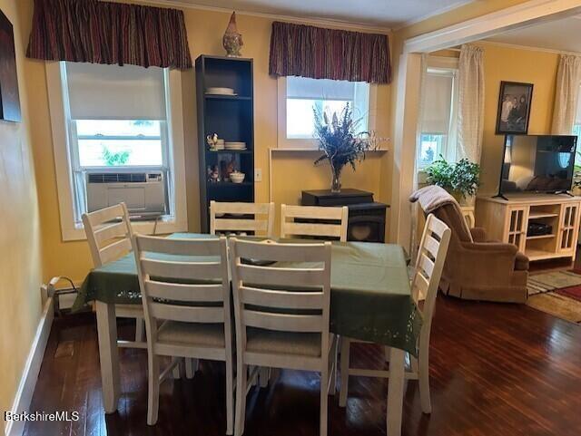 21 River St, North Adams, MA 01247 - dining area with wood finished floors, crown molding, and baseboards
