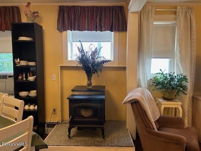 21 River St, North Adams, MA 01247 - sitting room with a wood stove