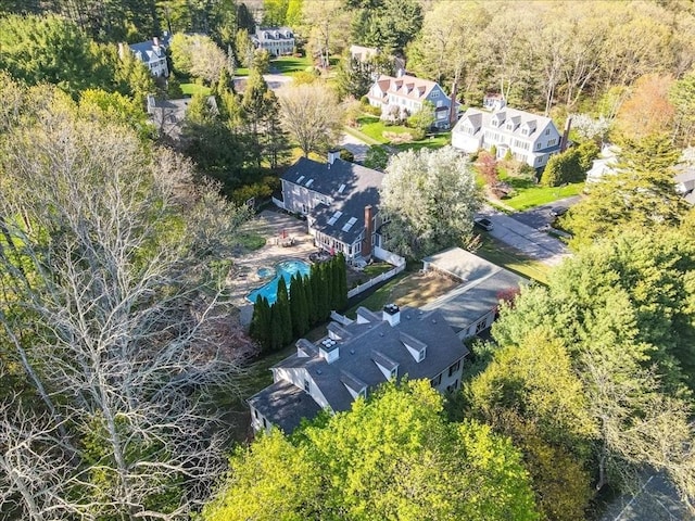 aerial view featuring a view of trees