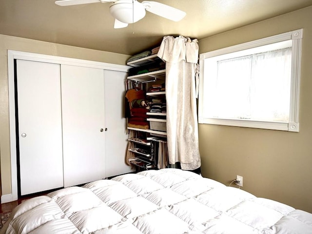 bedroom with a closet and a ceiling fan