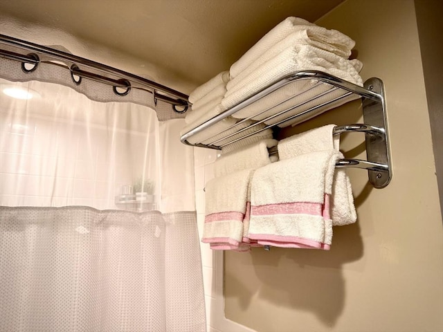 bathroom with a shower with curtain