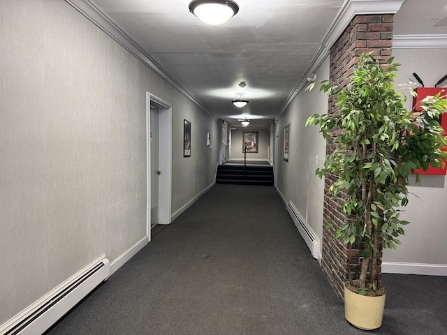 hallway with a baseboard radiator, ornamental molding, carpet flooring, baseboards, and stairs