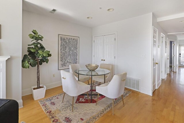 1306 Columbia Rd Unit 5C, Boston, MA 02127 - dining area with recessed lighting, visible vents, baseboards, and light wood-style floors