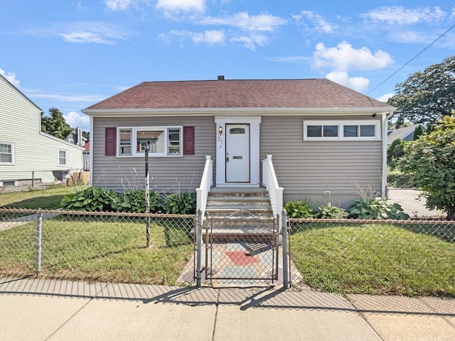 bungalow with a front yard