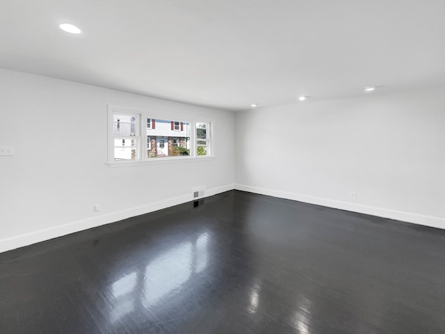 unfurnished room featuring hardwood / wood-style floors