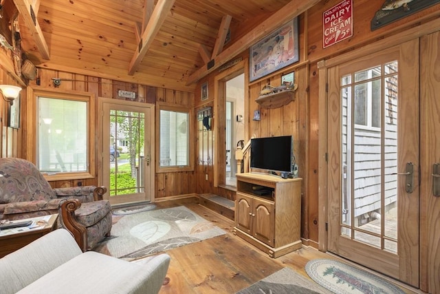 2 Rich Rd, Holliston, MA 01746 - living room with wood walls, light wood-style flooring, and wood ceiling