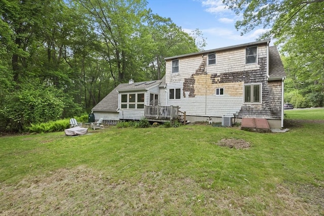 2 Rich Rd, Holliston, MA 01746 - back of property with a deck and a lawn