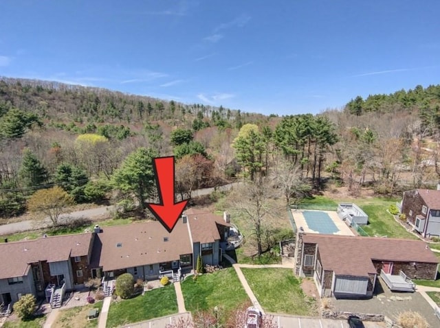 aerial view with a wooded view
