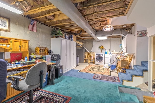 unfinished basement with washer / clothes dryer, carpet flooring, and stairway