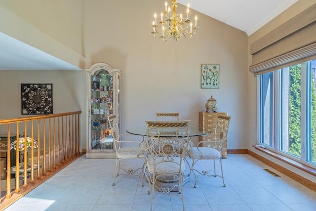 tiled dining room featuring high vaulted ceiling, an inviting chandelier, plenty of natural light, and visible vents