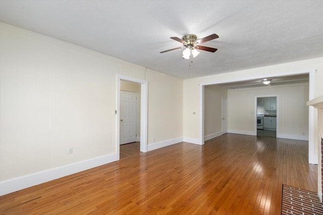 39-41 Arlington St, Methuen, MA 01844 - unfurnished living room with ceiling fan, hardwood / wood-style flooring, and baseboards