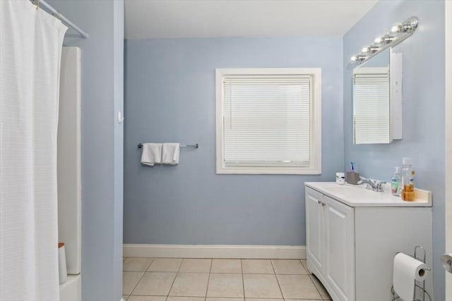 39-41 Arlington St, Methuen, MA 01844 - bathroom featuring vanity, baseboards, tile patterned floors, and shower / bath combo with shower curtain