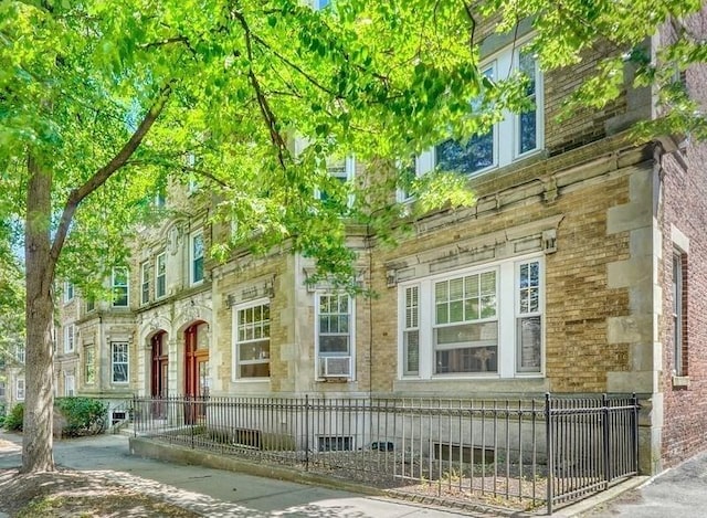 68 Parkman St Unit 3, Brookline, MA 02446 - view of exterior entry featuring stone siding
