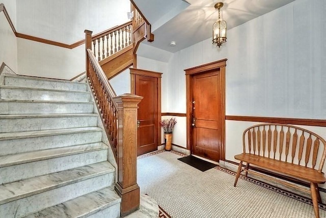 68 Parkman St Unit 3, Brookline, MA 02446 - stairs featuring a chandelier
