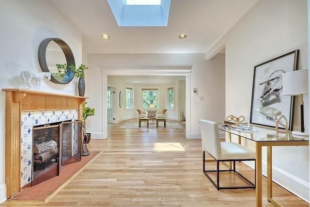 68 Parkman St Unit 3, Brookline, MA 02446 - corridor featuring light wood-style floors, a skylight, and recessed lighting