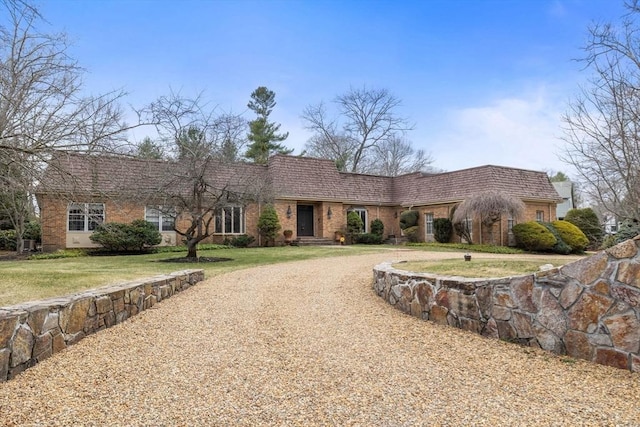 21 Wildewood Dr, Lynnfield, MA 01940 - ranch-style house featuring a front yard and brick siding