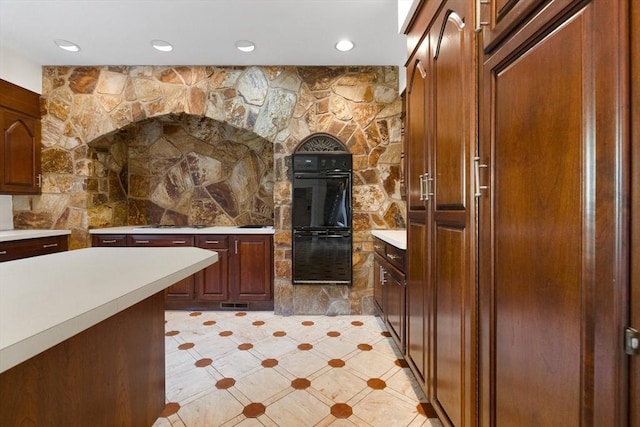 21 Wildewood Dr, Lynnfield, MA 01940 - kitchen with light tile patterned floors, light countertops, recessed lighting, and dobule oven black