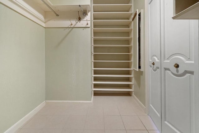 21 Wildewood Dr, Lynnfield, MA 01940 - spacious closet featuring tile patterned flooring