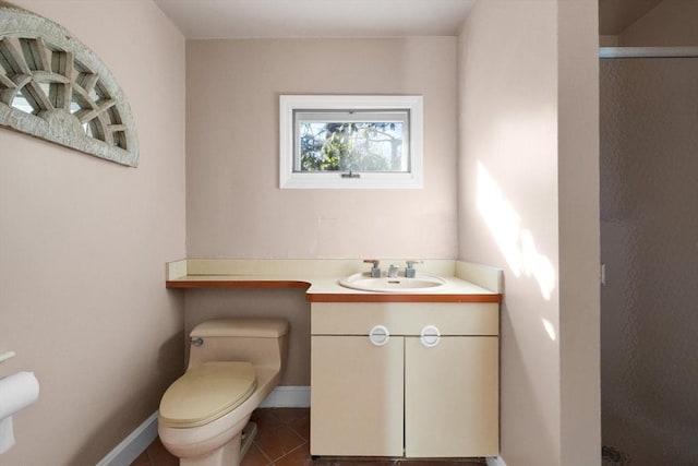 21 Wildewood Dr, Lynnfield, MA 01940 - bathroom with vanity, baseboards, tile patterned flooring, toilet, and a shower with shower door