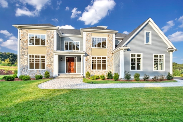 view of front of home featuring a front lawn