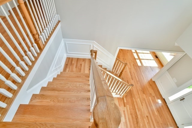 staircase with light wood-type flooring