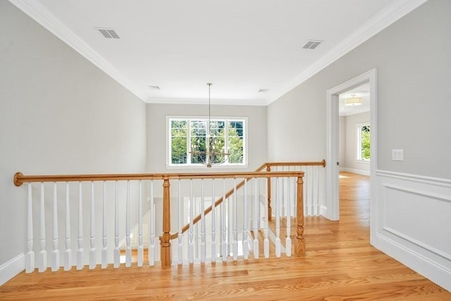 7 Stage Coach Rd, Lexington, MA 02421 - hall with an upstairs landing, visible vents, plenty of natural light, and wood finished floors
