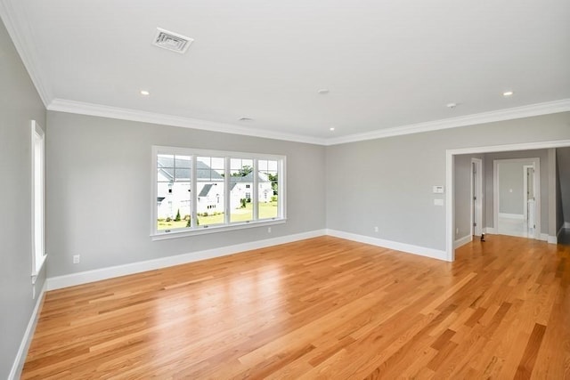 7 Stage Coach Rd, Lexington, MA 02421 - unfurnished room featuring baseboards, light wood-style flooring, visible vents, and crown molding