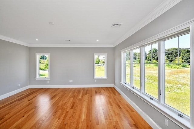 7 Stage Coach Rd, Lexington, MA 02421 - empty room with crown molding, light wood-type flooring, baseboards, visible vents, and recessed lighting
