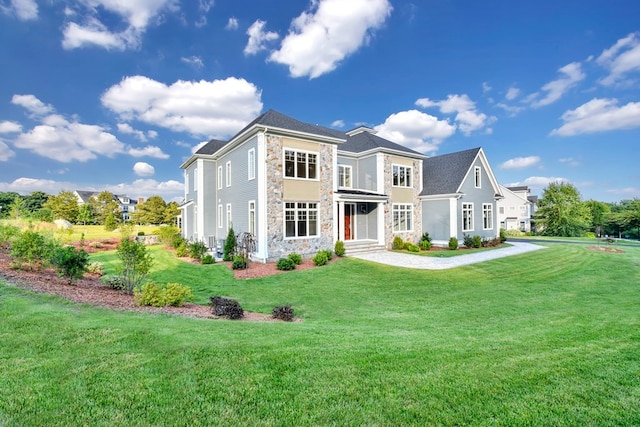 view of front of house with a front yard