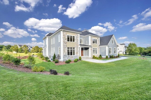 7 Stage Coach Rd, Lexington, MA 02421 - view of front of house featuring a front lawn and stone siding