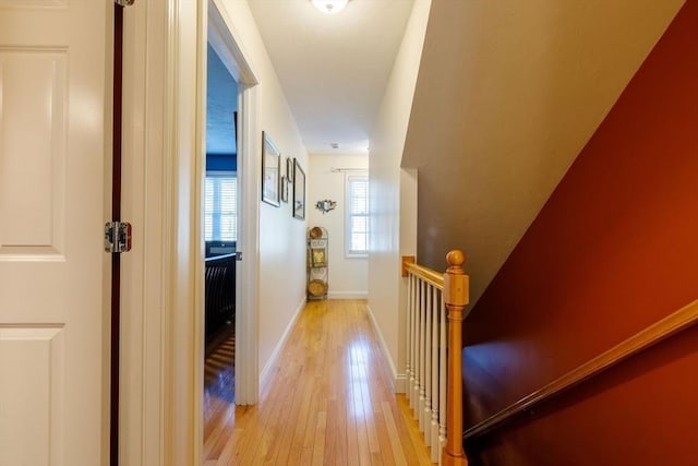 41 Whispering Pine Cir Unit 41, Worcester, MA 01606 - corridor featuring hardwood / wood-style floors, an upstairs landing, and baseboards