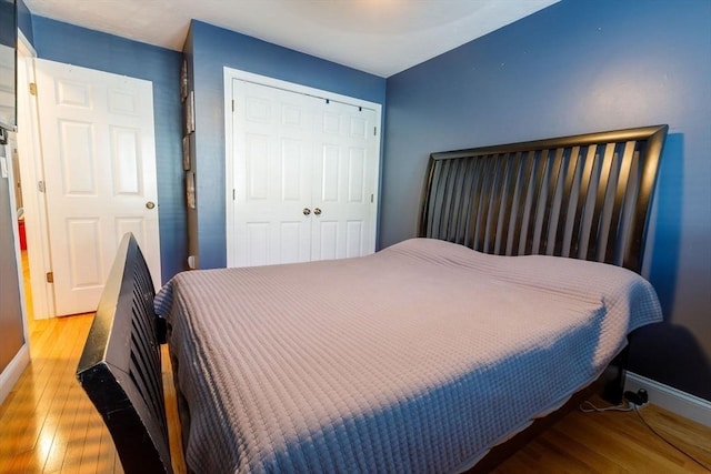 41 Whispering Pine Cir Unit 41, Worcester, MA 01606 - bedroom featuring wood finished floors, a closet, and baseboards