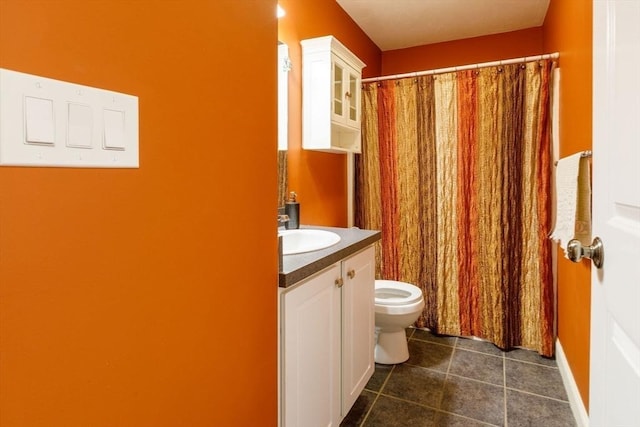 41 Whispering Pine Cir Unit 41, Worcester, MA 01606 - full bath featuring toilet, vanity, tile patterned floors, and a shower with curtain