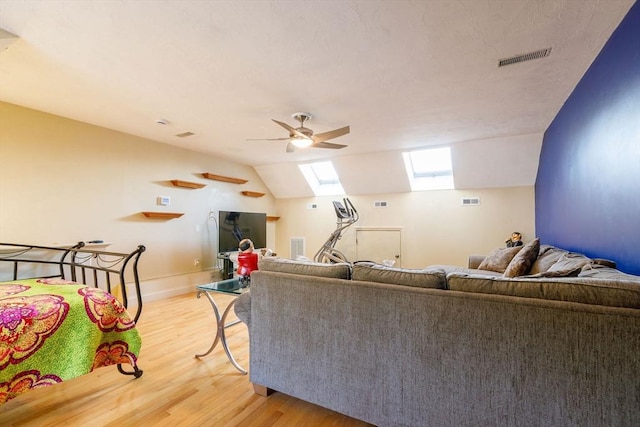 41 Whispering Pine Cir Unit 41, Worcester, MA 01606 - living area with a skylight, light wood-type flooring, a ceiling fan, and lofted ceiling