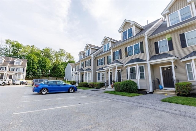 41 Whispering Pine Cir Unit 41, Worcester, MA 01606 - view of front of house featuring uncovered parking and a residential view