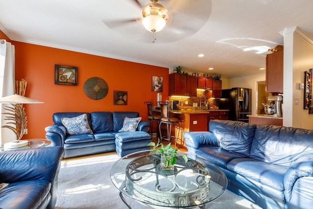 41 Whispering Pine Cir Unit 41, Worcester, MA 01606 - living area with ornamental molding, a ceiling fan, and carpet flooring