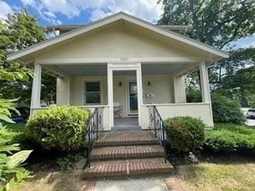192 Salem St, Wakefield, MA 01880 - bungalow-style home with a porch and stucco siding