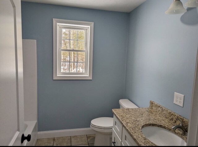 full bathroom featuring toilet, shower with separate bathtub, vanity, and tile patterned floors