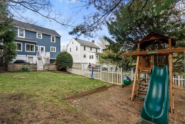 view of yard featuring a playground and stairway