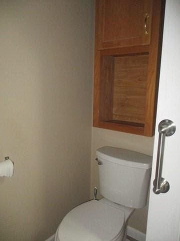 bathroom featuring toilet