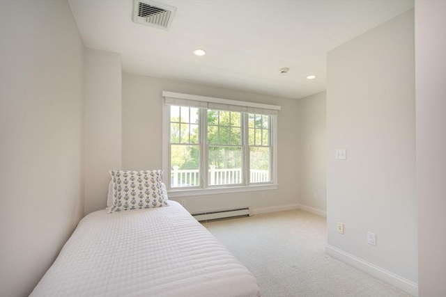 bedroom featuring light carpet, baseboards, visible vents, baseboard heating, and recessed lighting