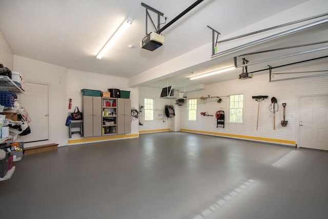 garage featuring a garage door opener