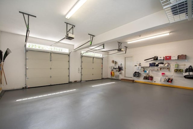 garage featuring a garage door opener