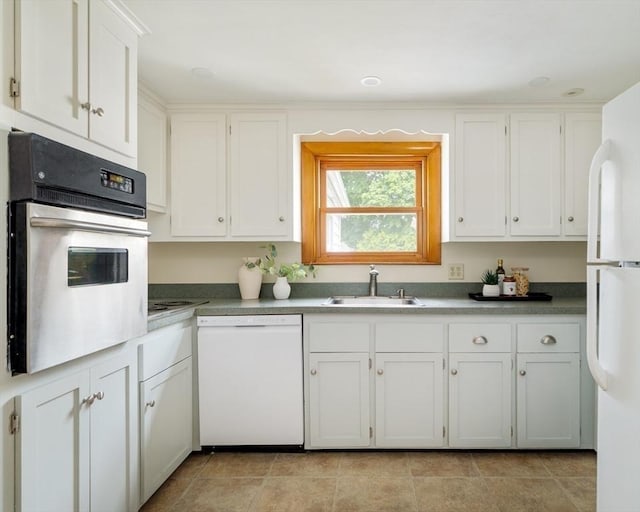 51 Burget Ave, Medford, MA 02155 - kitchen with white appliances, a sink, and white cabinetry