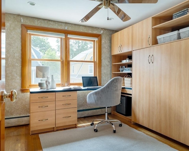 51 Burget Ave, Medford, MA 02155 - office with a baseboard radiator, wood finished floors, a ceiling fan, and built in study area